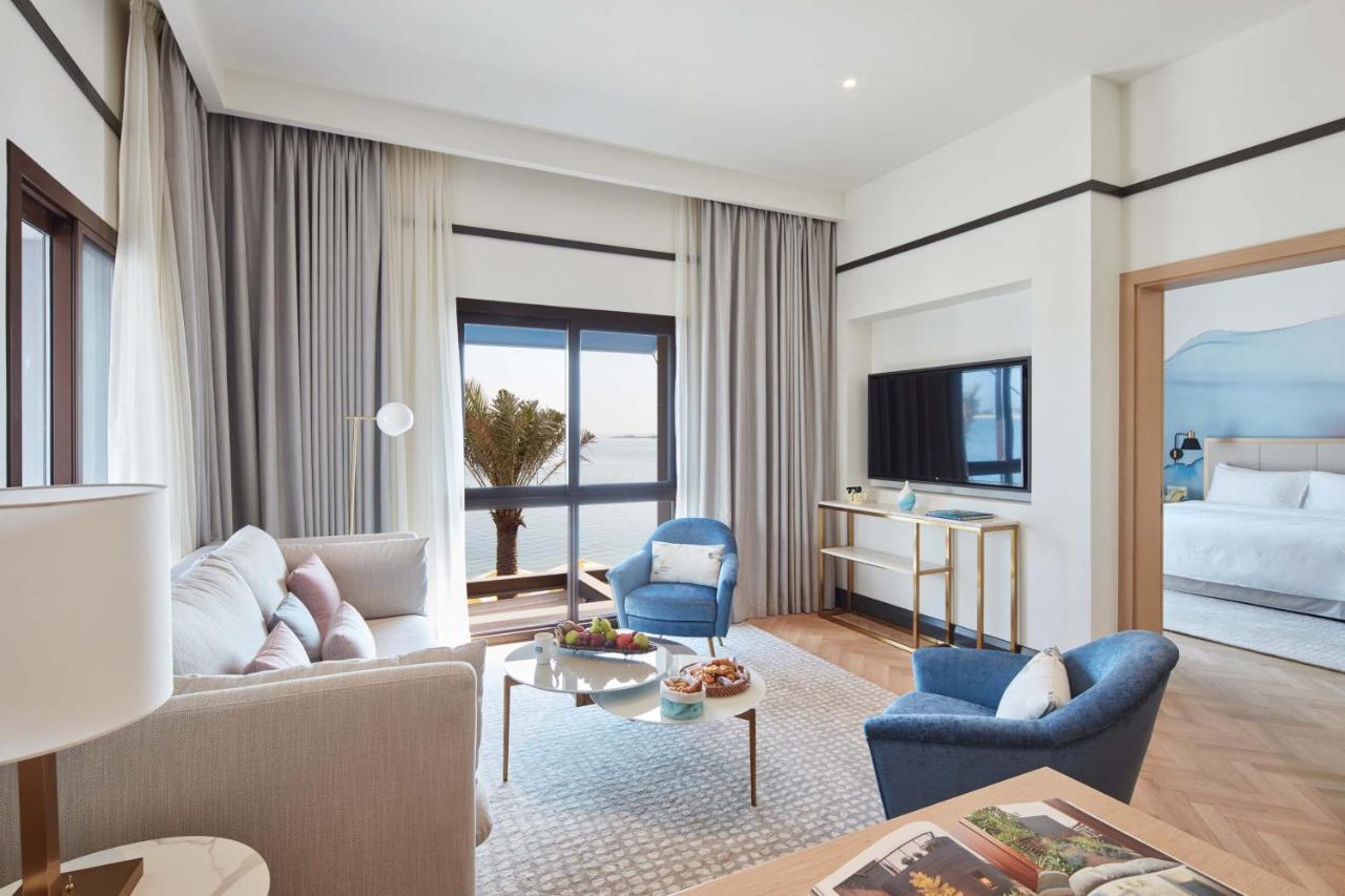 Vida Beach Resort Umm Al Quwain ภายนอก รูปภาพ A suite at the hotel