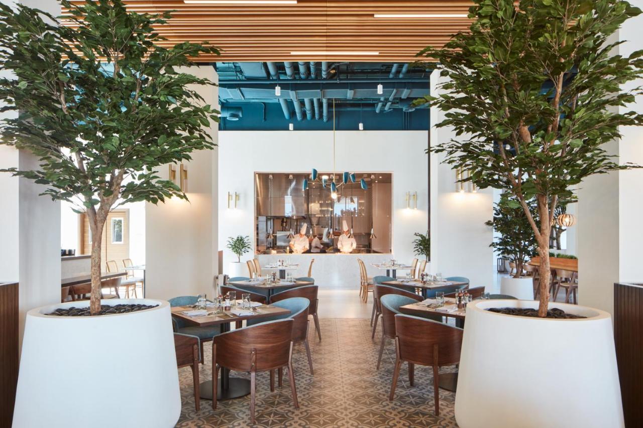 Vida Beach Resort Umm Al Quwain ภายนอก รูปภาพ The interior of the restaurant
