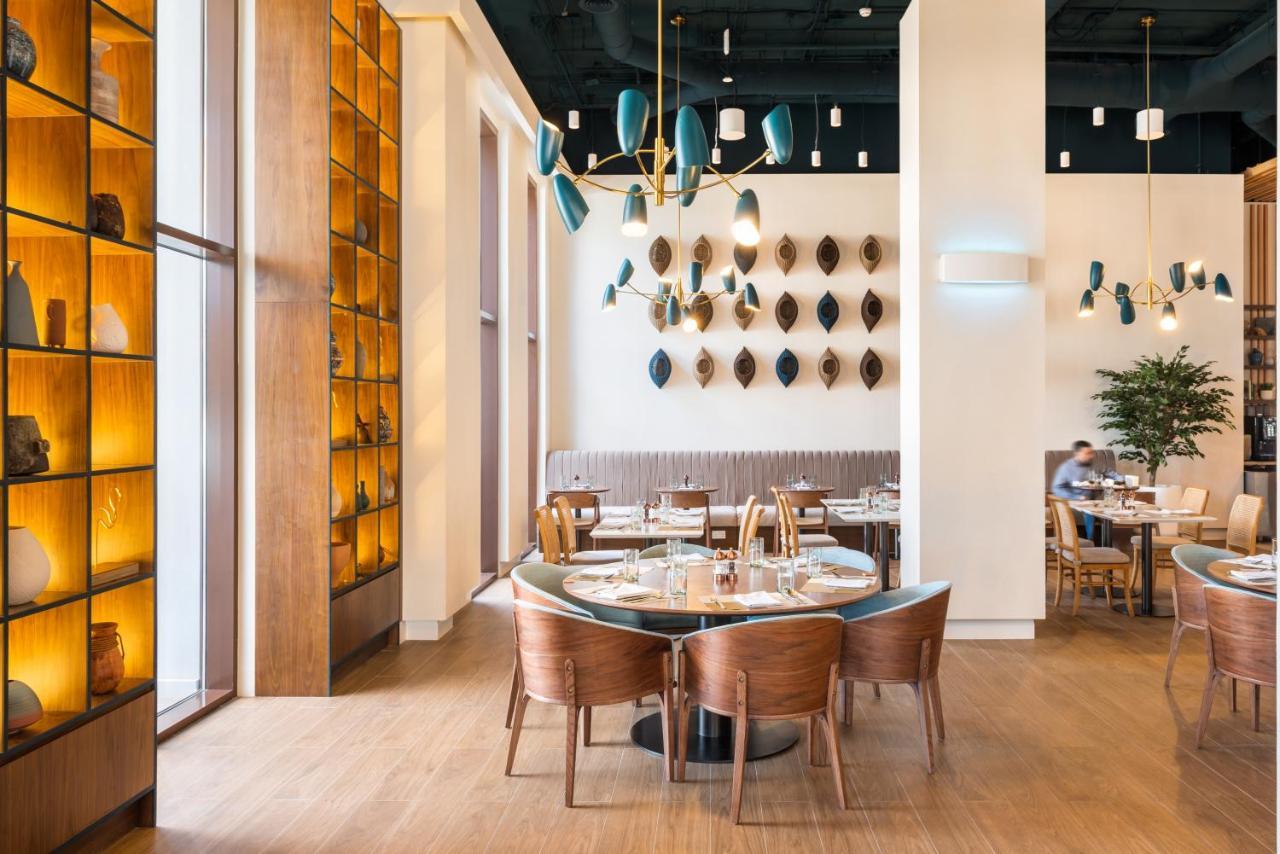 Vida Beach Resort Umm Al Quwain ภายนอก รูปภาพ Interior of the restaurant